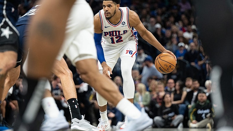 Dec 27, 2023; Orlando, Florida, USA; Philadelphia 76ers forward Tobias Harris (12) dribbles the ball against the Orlando Magic at Kia Center. Mandatory Credit: Jeremy Reper-USA TODAY Sports
