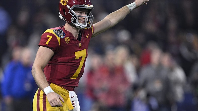 Dec 27, 2023; San Diego, CA, USA; USC Trojans quarterback Miller Moss (7) gestures during a running play against the Louisville Cardinals in the second half at Petco Park. Mandatory Credit: Orlando Ramirez-USA TODAY Sports