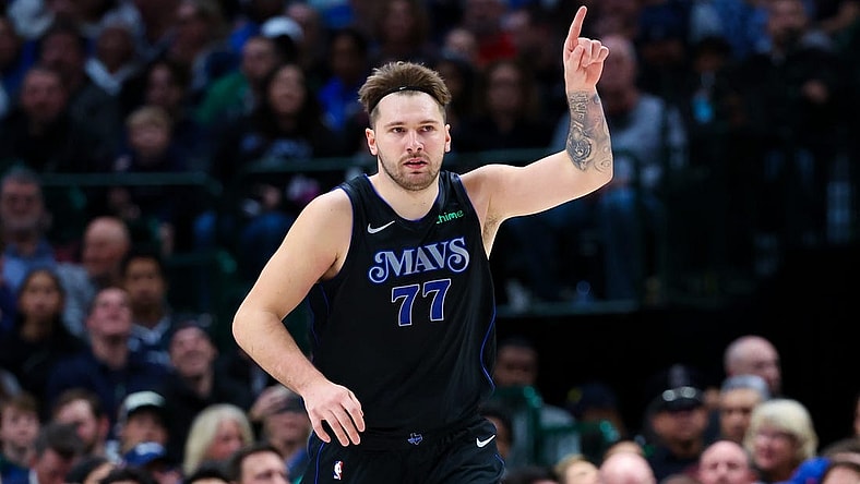 Dec 27, 2023; Dallas, Texas, USA;  Dallas Mavericks guard Luka Doncic (77) reacts after scoring during the first quarter against the Cleveland Cavaliers at American Airlines Center. Mandatory Credit: Kevin Jairaj-USA TODAY Sports