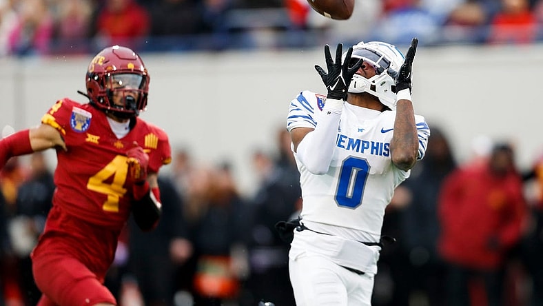 Memphis' Demeer Blankumsee (0) catches a pass for a touchdown in the opening drive during the game between the University of Memphis and Iowa State University in the AutoZone Liberty Bowl at Simmons Bank Liberty Stadium on Dec. 29, 2023.