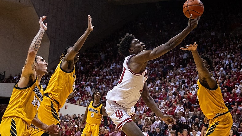Dec 29, 2023; Bloomington, Indiana, USA; Indiana Hoosiers forward Kaleb Banks (10) shoots the ball while Kennesaw State Owls defend in the first half at Simon Skjodt Assembly Hall. Mandatory Credit: Trevor Ruszkowski-USA TODAY Sports