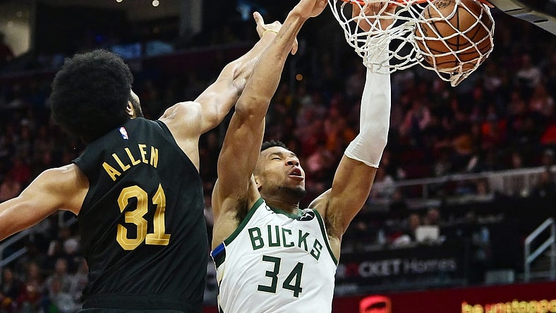 Dec 29, 2023; Cleveland, Ohio, USA; Milwaukee Bucks forward Giannis Antetokounmpo (34) dunks as Cleveland Cavaliers center Jarrett Allen (31) defends during the second half at Rocket Mortgage FieldHouse. Mandatory Credit: Ken Blaze-USA TODAY Sports