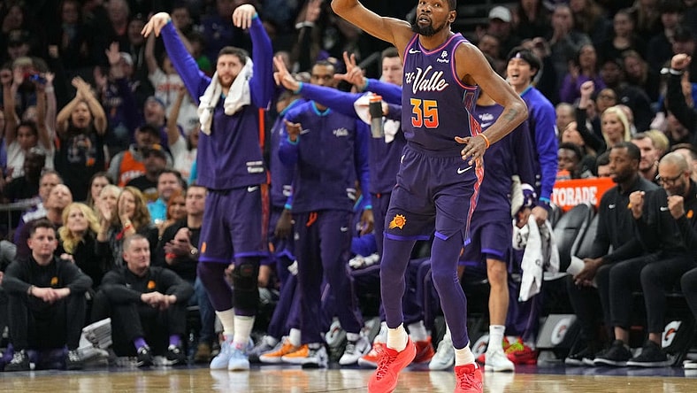 Dec 29, 2023; Phoenix, Arizona, USA; Phoenix Suns forward Kevin Durant (35) reacts against the Charlotte Hornets during the second half at Footprint Center. Mandatory Credit: Joe Camporeale-USA TODAY Sports