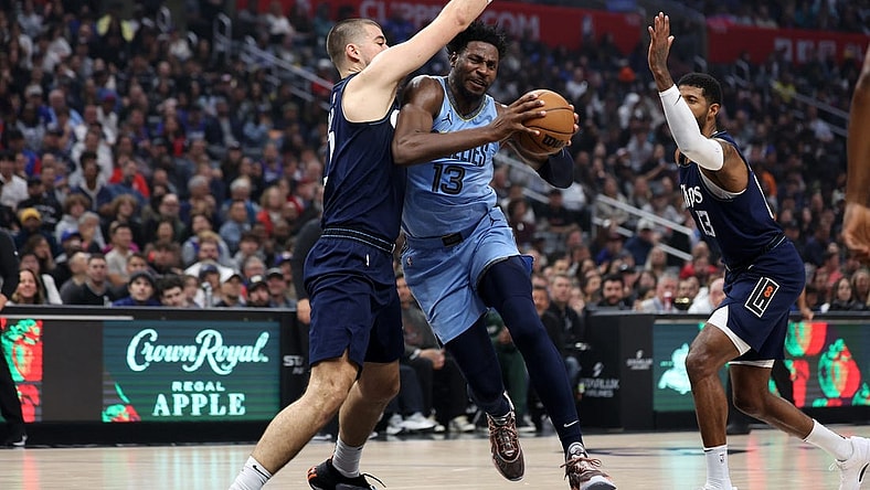 Dec 29, 2023; Los Angeles, California, USA;  Memphis Grizzlies forward Jaren Jackson Jr. (13) drives to the basket against Los Angeles Clippers center Ivica Zubac (40) during the first quarter at Crypto.com Arena. Mandatory Credit: Kiyoshi Mio-USA TODAY Sports
