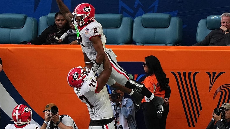 Dec 30, 2023; Miami Gardens, FL, USA; Georgia Bulldogs running back Kendall Milton (2) reacts after scoring a touchdown against the Florida State Seminoles during the first half in the 2023 Orange Bowl at Hard Rock Stadium. Mandatory Credit: Jasen Vinlove-USA TODAY Sports