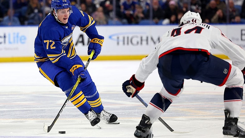 Dec 30, 2023; Buffalo, New York, USA;  Columbus Blue Jackets defenseman Erik Gudbranson (44) looks to block a pass by Buffalo Sabres right wing Tage Thompson (72) during the second period at KeyBank Center. Mandatory Credit: Timothy T. Ludwig-USA TODAY Sports