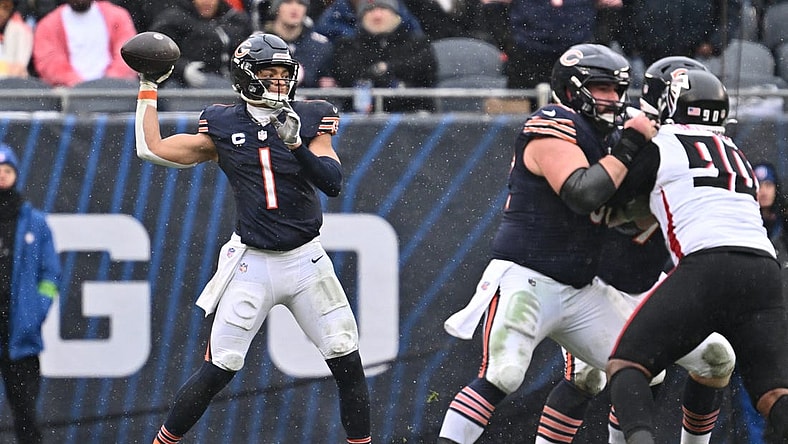 Dec 31, 2023; Chicago, Illinois, USA;  Chicago Bears quarterback Justin Fields (1) passes in the first half against the Atlanta Falcons at Soldier Field. Mandatory Credit: Jamie Sabau-USA TODAY Sports