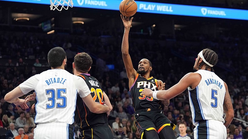 Dec 31, 2023; Phoenix, Arizona, USA; Phoenix Suns forward Kevin Durant (35) shoots against the Orlando Magic during the first half at Footprint Center. Mandatory Credit: Joe Camporeale-USA TODAY Sports