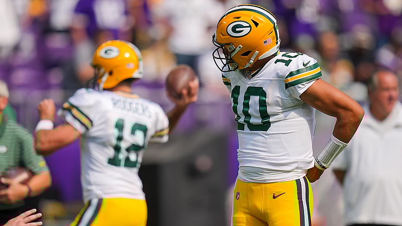 Green Bay Packers quarterbacks Jordan Love and Aaron Rodgers