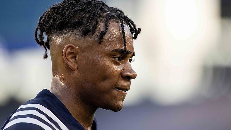 Jun 23, 2021; Foxborough, Massachusetts, USA; New England Revolution defender Dejuan Jones (24) reacts against the New York Red Bulls at Gillette Stadium. Mandatory Credit: Paul Rutherford-USA TODAY Sports
