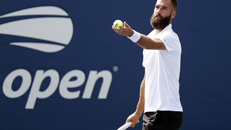 Aug 30, 2021; Flushing, NY, USA; Benoit Paire (FRA) serves to Dusan Lajovic (SRB) in a first round match on day one of the 2021 U.S. Open tennis tournament at USTA Billie King National Tennis Center. Mandatory Credit: Jerry Lai-USA TODAY Sports