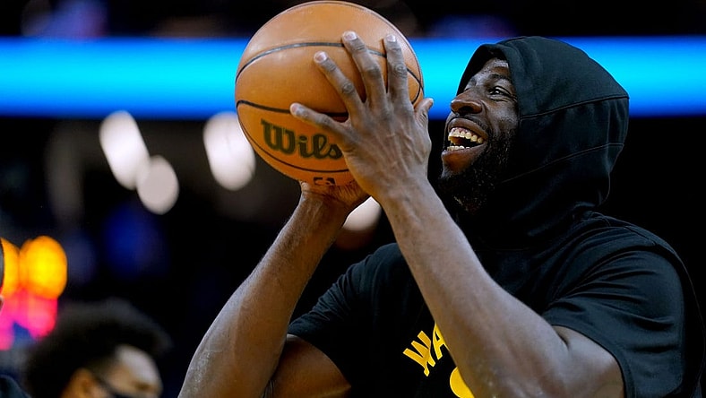 Nov 24, 2021; San Francisco, California, USA; Golden State Warriors forward Draymond Green (23) smiles during warmups before the start of the game against the Philadelphia 76ers at the Chase Center. Mandatory Credit: Cary Edmondson-USA TODAY Sports