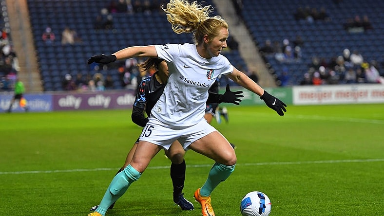 Mar 25, 2022; Bridgeview, IL, USA; Kansas City Current midfielder Sam Mewis (15) runs the ball during first half against Chicago Red Stars in a NWSL Challenge Cup match at SeatGeek Stadium. Mandatory Credit: Daniel Bartel-USA TODAY Sports
