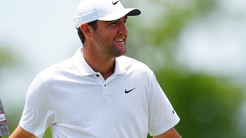 Apr 22, 2022; Avondale, Louisiana, USA; Scottie Scheffler smiles on the ninth hole green during the second round of the Zurich Classic of New Orleans golf tournament. Mandatory Credit: Andrew Wevers-USA TODAY Sports