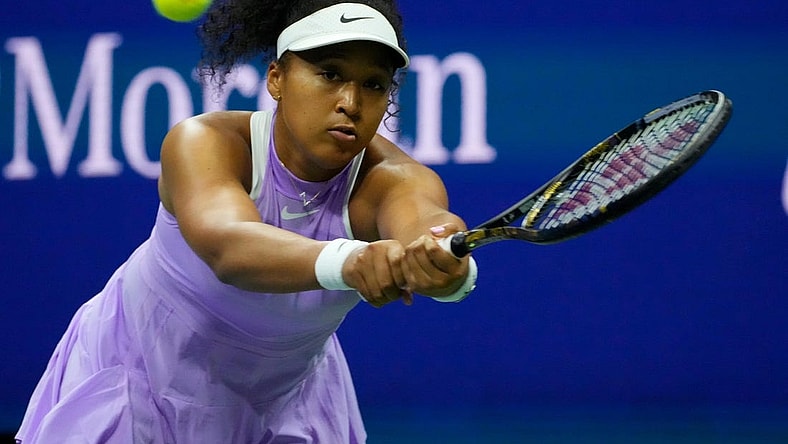 Aug 30, 2022; Flushing, NY, USA;    NaomiOsaka of Japan hits to Danielle Collins of the USA on day two of the 2022 U.S. Open tennis tournament at USTA Billie Jean King National Tennis Center. Mandatory Credit: Robert Deutsch-USA TODAY Sports