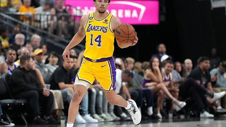 Oct 6, 2022; Las Vegas, Nevada, USA; Los Angeles Lakers guard Scotty Pippen Jr. (14) dribbles against the Minnesota Timberwolves during a preseason game at T-Mobile Arena. Mandatory Credit: Stephen R. Sylvanie-USA TODAY Sports