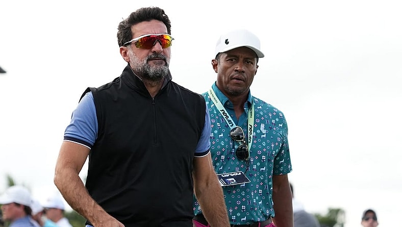 Oct 29, 2022; Miami, Florida, USA; Yasir Al-Rumayyan (L) walks next to Saudi golf CEO Majed Al Surour (R) during the second round of the season finale of the LIV Golf series at Trump National Doral. Mandatory Credit: Jasen Vinlove-USA TODAY Sports