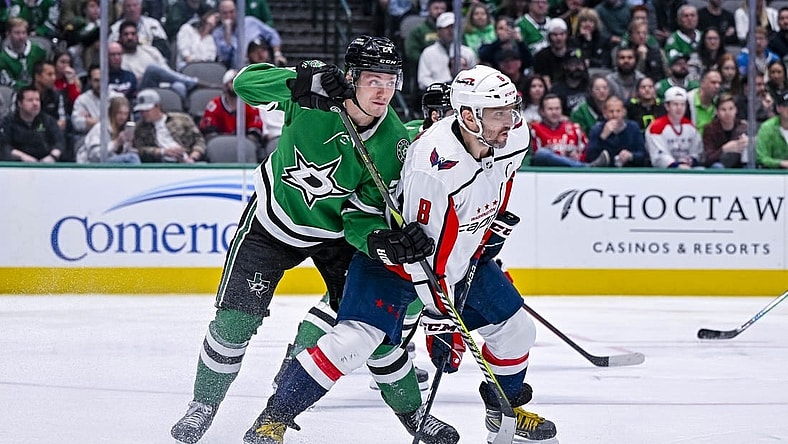 Oct 27, 2022; Dallas, Texas, USA; Dallas Stars center Roope Hintz (24) and Washington Capitals left wing Alex Ovechkin (8) in action during the game between the Dallas Stars and the Washington Capitals at the American Airlines Center. Mandatory Credit: Jerome Miron-USA TODAY Sports