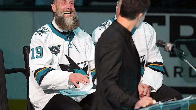 Feb 25, 2023; San Jose, California, USA; San Jose Sharks former player Joe Thornton laughs during the Patrick Marleau jersey retirement ceremony before the game against the Chicago Blackhawks at SAP Center at San Jose. Mandatory Credit: Darren Yamashita-USA TODAY Sports