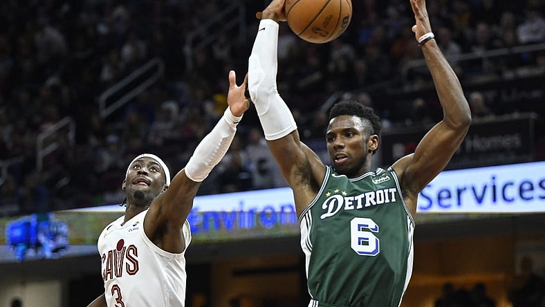 Mar 4, 2023; Cleveland, Ohio, USA; Detroit Pistons guard Hamidou Diallo (6) rebounds beside Cleveland Cavaliers guard Caris LeVert (3)in the fourth quarter at Rocket Mortgage FieldHouse. Mandatory Credit: David Richard-USA TODAY Sports