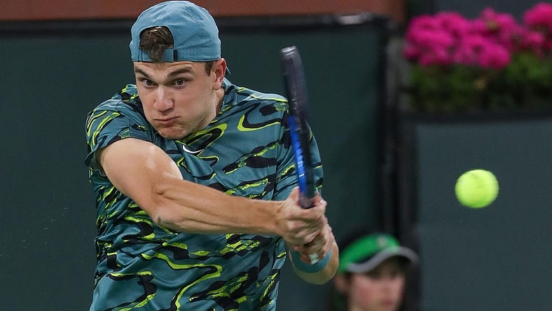 Jack Draper hits a shot during his match against Carlos Alcarez at the BNP Paribas Open in Indian Wells, Calif., March 14, 2023.

Bnp Tuesday 12