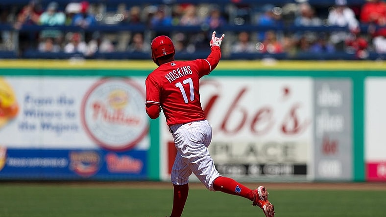 Mar 20, 2023; Clearwater, Florida, USA;  Philadelphia Phillies first baseman Rhys Hoskins (17) rounds the bases after hitting a two-run home run against the Baltimore Orioles in the second inning during spring training at BayCare Ballpark. Mandatory Credit: Nathan Ray Seebeck-USA TODAY Sports