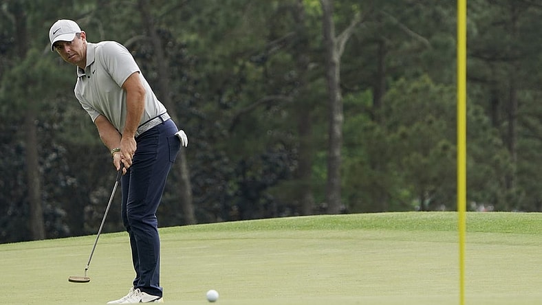 Apr 7, 2023; Augusta, Georgia, USA; Rory McIlroy putts on no. 18 during the second round of The Masters golf tournament. Mandatory Credit: Katie Goodale USA TODAY Network