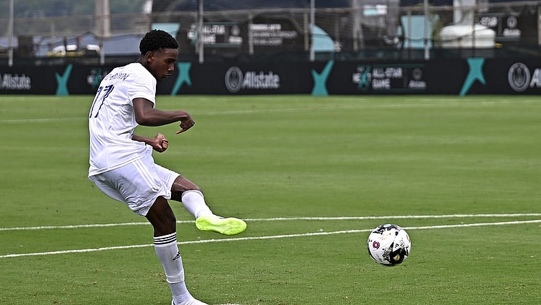 Jul 19, 2023; Annapolis, MD, USA; MLS NEXT East player Tahir Reid-Brown (17) of Orlando City SC scores on a penalty kick during a shootout in the 2023 MLS NEXT All Star Game at Glenn Warner Soccer Facility at the Naval Academy. Mandatory Credit: Reggie Hildred-USA TODAY Sports