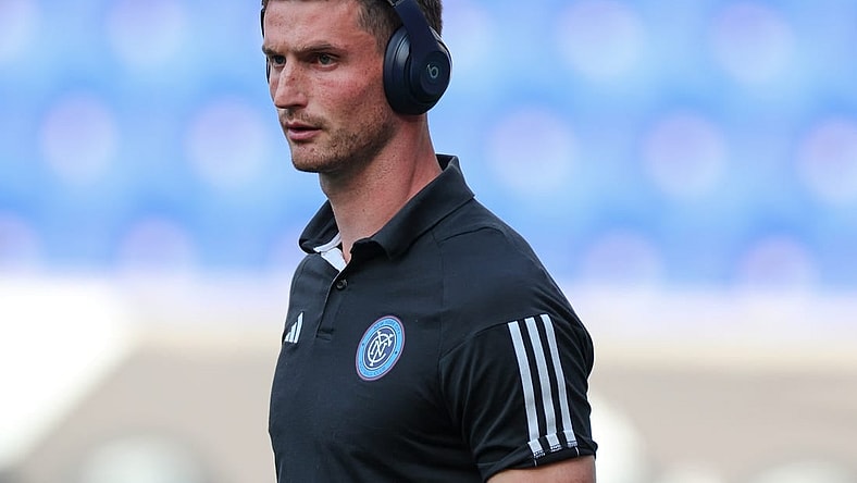 Jul 26, 2023; Harrison, NJ, USA; New York City FC goalkeeper Cody Mizell (25) with beats wireless headphones on the pitch before the match against Toronto FC at Red Bull Arena. Mandatory Credit: Vincent Carchietta-USA TODAY Sports