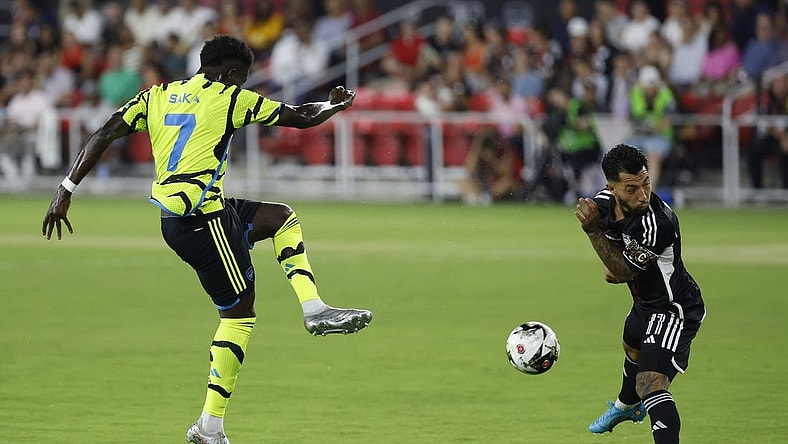Jul 19, 2023; Washington, DC, USA; MLS All-Stars midfielder Luciano Acosta (11) blocks the shot of Arsenal midfielder Bukayo Saka (7) in the 2023 MLS All Star Game at Audi Field. Mandatory Credit: Geoff Burke-USA TODAY Sports