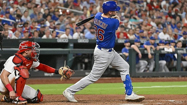 Jul 28, 2023; St. Louis, Missouri, USA;  Chicago Cubs first baseman Trey Mancini (36) hits a one run single against the St. Louis Cardinals during the sixth inning at Busch Stadium. Mandatory Credit: Jeff Curry-USA TODAY Sports