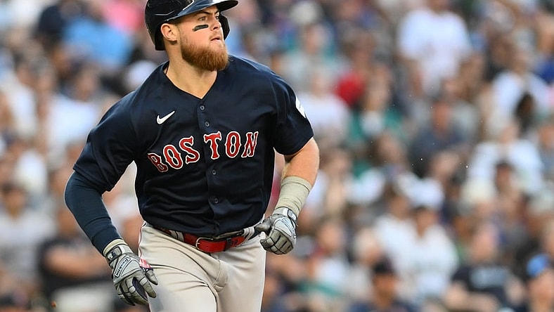 Aug 1, 2023; Seattle, Washington, USA; Boston Red Sox second baseman Christian Arroyo (39) runs toward first base after hitting a two run RBI double against the Seattle Mariners during the fourth inning at T-Mobile Park. Mandatory Credit: Steven Bisig-USA TODAY Sports