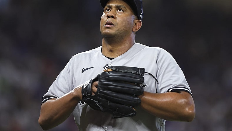 Aug 13, 2023; Miami, Florida, USA; New York Yankees relief pitcher Wandy Peralta (58) looks on as he leaves the game against the Miami Marlins during the eighth inning at loanDepot Park. Mandatory Credit: Sam Navarro-USA TODAY Sports