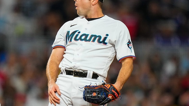 Aug 14, 2023; Miami, Florida, USA; Miami Marlins relief pitcher David Robertson (19) reacts to a call from the umpire against the Houston Astros during the ninth inning at loanDepot Park. Mandatory Credit: Rich Storry-USA TODAY Sports