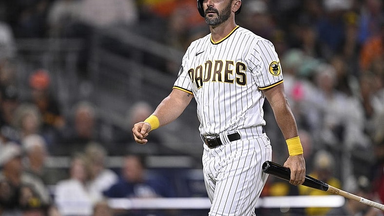 Aug 15, 2023; San Diego, California, USA; San Diego Padres pinch hitter Matt Carpenter (14) walks to the dugout after striking out during the seventh inning against the Baltimore Orioles at Petco Park. Mandatory Credit: Orlando Ramirez-USA TODAY Sports