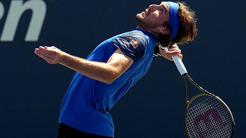 Aug 30, 2023; Flushing, NY, USA; Stefanos Tsitsipas of Greece serves to Dominic Stricker of Switzerland on day three of the 2023 U.S. Open tennis tournament at USTA Billie Jean King National Tennis Center. Mandatory Credit: Danielle Parhizkaran-USA TODAY Sports