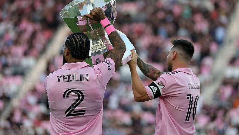 Aug 30, 2023; Fort Lauderdale, Florida, USA; Inter Miami defender DeAndre Yedlin (2) and forward Lionel Messi (10)  hoist the Leagues Cup trophy before the game against Nashville SC at DRV PNK Stadium. Mandatory Credit: Sam Navarro-USA TODAY Sports