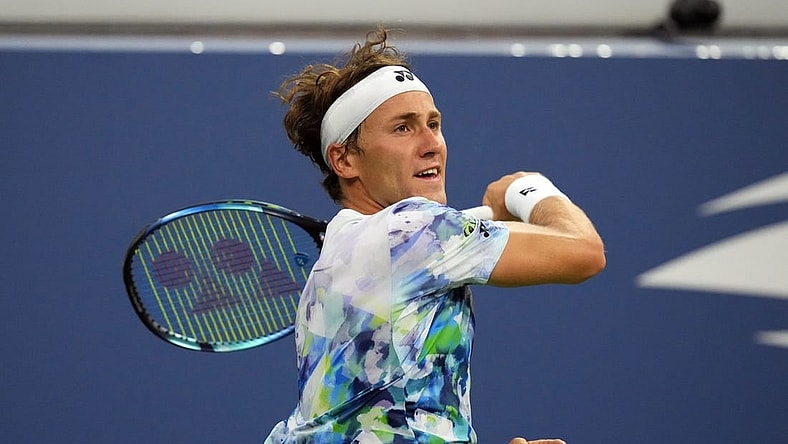 Aug 30, 2023; Flushing, NY, USA; Casper Ruud of Norway hits to Zhizhen Zhang of China on day three of the 2023 U.S. Open Tennis Championships at USTA Billie Jean King National Tennis Center. Mandatory Credit: Danielle Parhizkaran-USA TODAY Sports