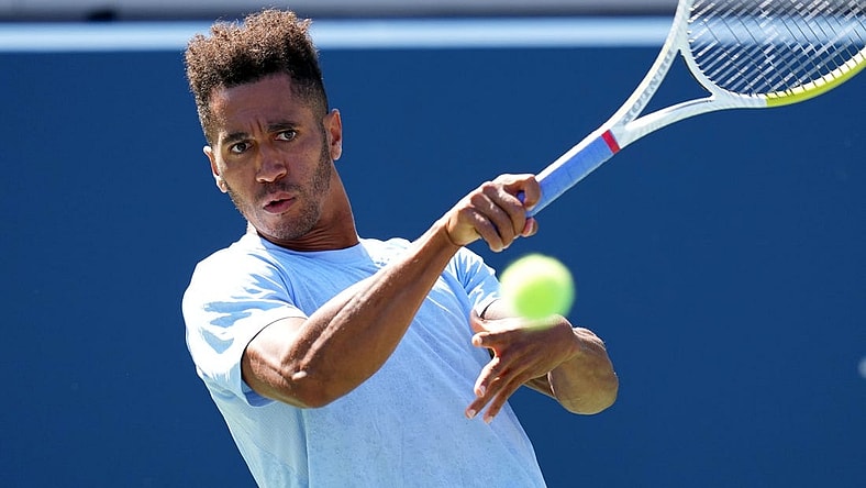 Sep 2, 2023; Flushing, NY, USA; Michael Mmoh of the United States hits to Jack Draper of Great Britain on day six of the 2023 U.S. Open tennis tournament at USTA Billie Jean King National Tennis Center. Mandatory Credit: Danielle Parhizkaran-USA TODAY Sports