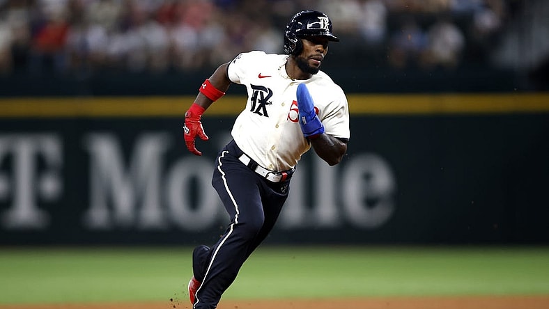 Sep 2, 2023; Arlington, Texas, USA; Texas Rangers left fielder J.P. Martinez (50) runs to third base in the fourth inning against the Minnesota Twins at Globe Life Field. Mandatory Credit: Tim Heitman-USA TODAY Sports