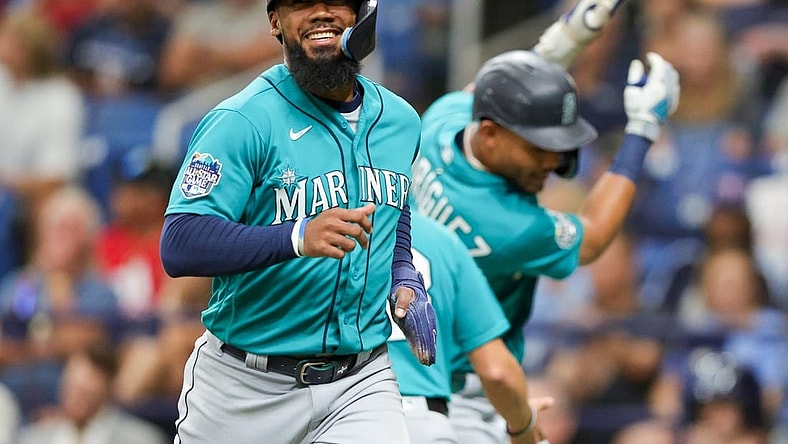 Sep 9, 2023; St. Petersburg, Florida, USA;  Seattle Mariners right fielder Teoscar Hernandez (35) celebrates after scoring a run against the Tampa Bay Rays in the first inning at Tropicana Field. Mandatory Credit: Nathan Ray Seebeck-USA TODAY Sports