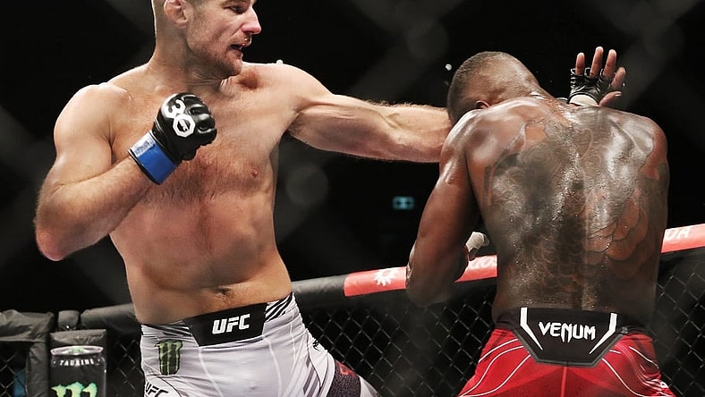 Sep 9, 2023; Sydney, NSW, AUSTRALIA; Israel Adesanya (red gloves) fights Sean Strickland (blue gloves) during UFC 293 at Qudos Bank Arena. Mandatory Credit: Jasmin Frank-USA TODAY Sports