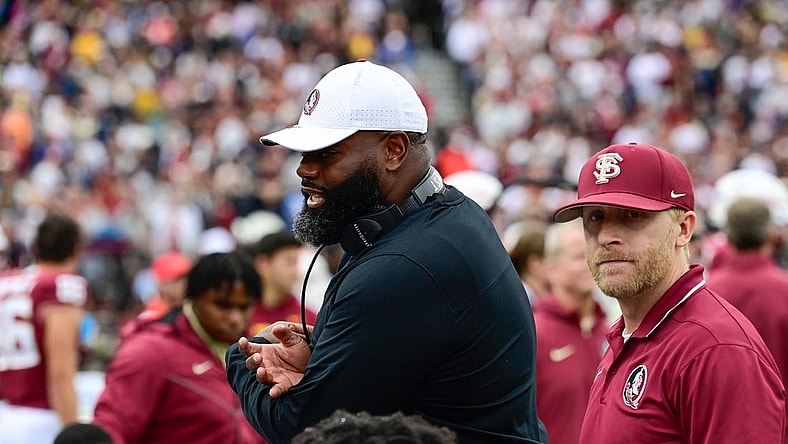 Sep 16, 2023; Chestnut Hill, Massachusetts, USA; Florida State Seminoles offensive coordinator Alex Atkins speaks to the team during the second half against the Boston College Eagles at Alumni Stadium. Mandatory Credit: Eric Canha-USA TODAY Sports