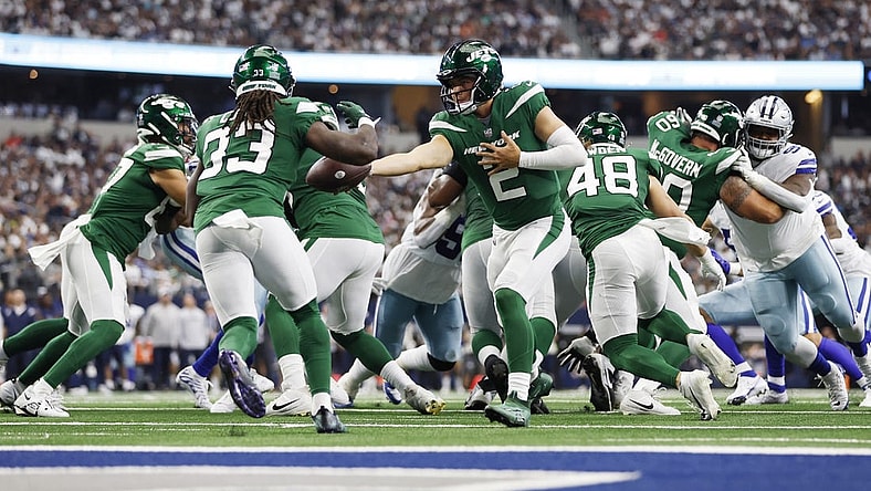 Sep 17, 2023; Arlington, Texas, USA; New York Jets quarterback Zach Wilson (2) hands off to running back Dalvin Cook (33) in the third quarter against the Dallas Cowboys at AT&T Stadium. Mandatory Credit: Tim Heitman-USA TODAY Sports