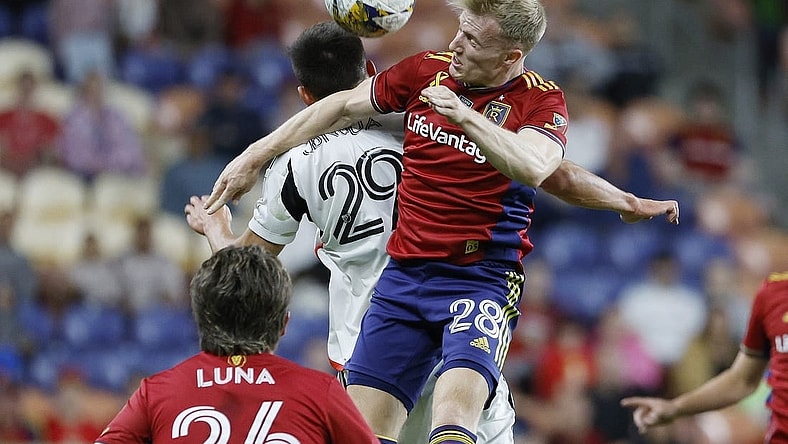 Sep 20, 2023; Sandy, Utah, USA; Real Salt Lake defender Jasper Loffelsend (28) and FC Dallas defender Sam Junqua (29) battle in the second half at America First Field. Mandatory Credit: Jeff Swinger-USA TODAY Sports