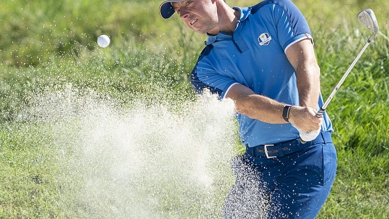 September 27, 2023; Rome, ITA; Team Europe golfer Rory McIlroy hits his bunker shot on the 16th hole during a practice day for the Ryder Cup golf competition at Marco Simone Golf and Country Club. Mandatory Credit: Kyle Terada-USA TODAY Sports
