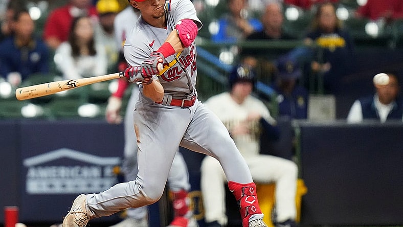 St. Louis Cardinals second baseman Tommy Edman (19) singles on a ground ball to Milwaukee Brewers center fielder Blake Perkins (16) during the fifth inning of the game on Wednesday September 27, 2023 at American Family Field in Milwaukee, Wis.