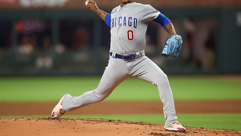 Sep 28, 2023; Atlanta, Georgia, USA; Chicago Cubs starting pitcher Marcus Stroman (0) throws against the Atlanta Braves in the first inning at Truist Park. Mandatory Credit: Brett Davis-USA TODAY Sports