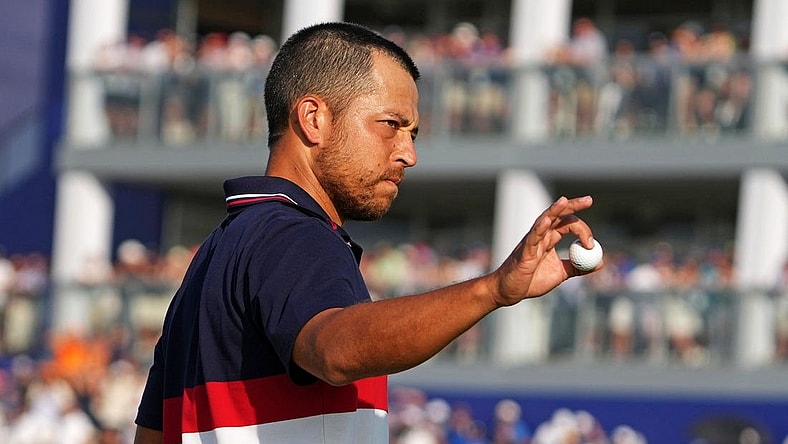 Oct 1, 2023; Rome, ITA; Team USA golfer Xander Schauffele waves after winning on the 16th hole during the final day of the 44th Ryder Cup golf competition at Marco Simone Golf and Country Club. Mandatory Credit: Kyle Terada-USA TODAY Sports