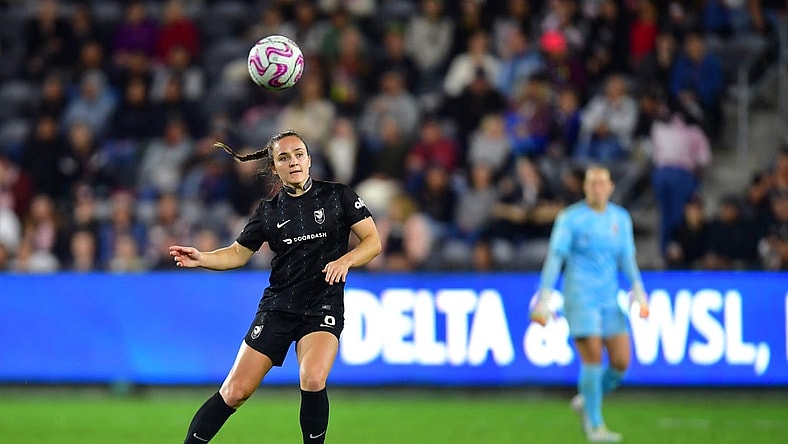 Oct 2, 2023; Los Angeles, California, USA; Angel City FC defender Megan Reid (6) passes the ball during the second half against the Orlando Pride at BMO Stadium. Mandatory Credit: Gary A. Vasquez-USA TODAY Sports